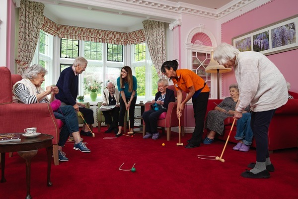 Residents playing croquet