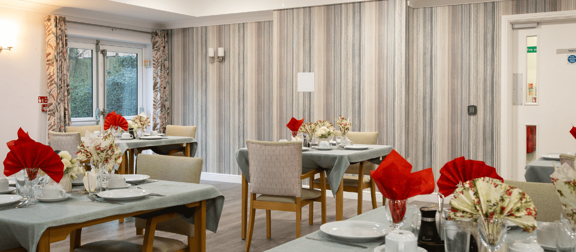 Spacious dining room at Woodchurch House Care Home in Woodchurch, Ashford